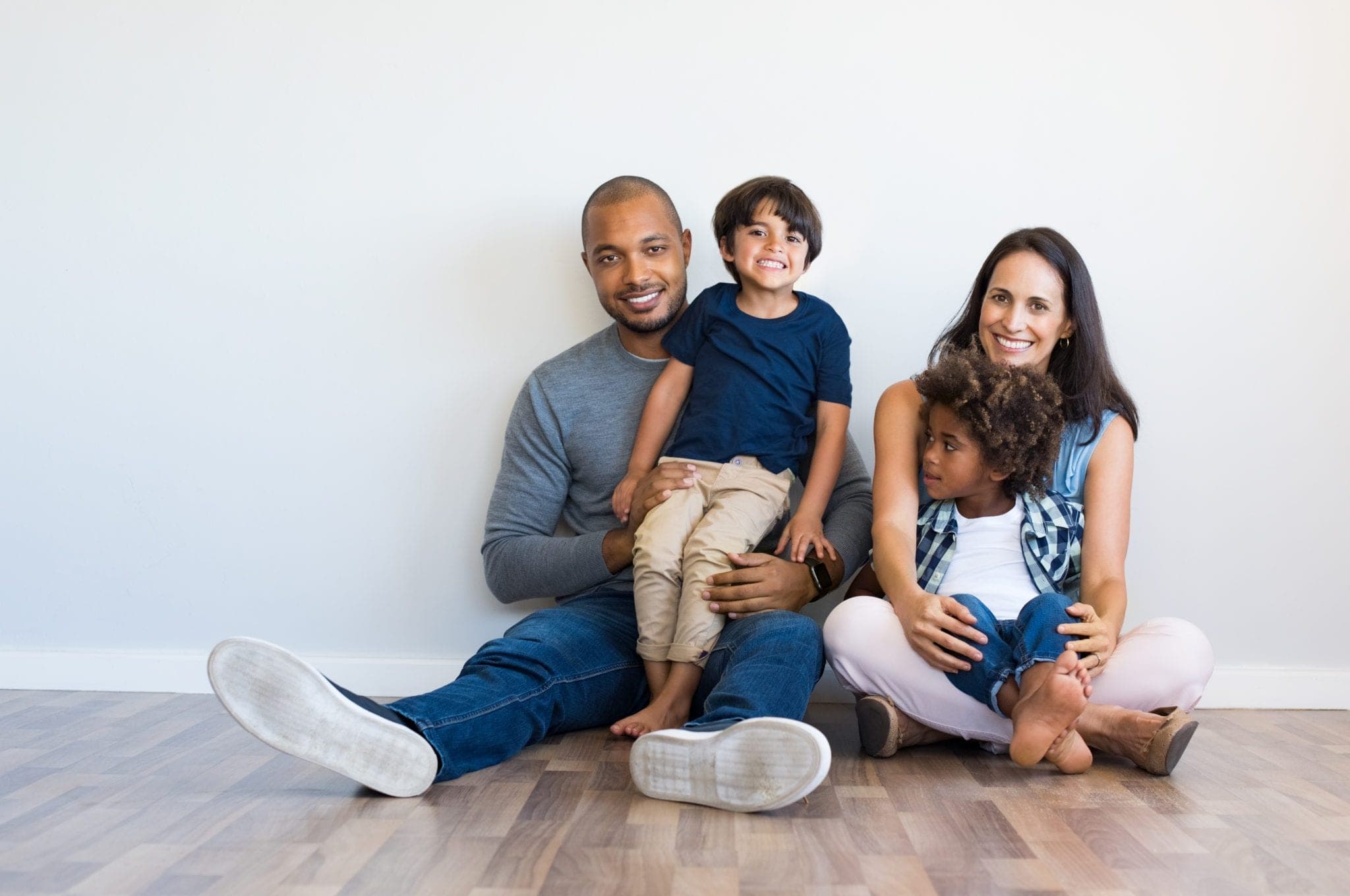 Happy multiethnic family smiling together
