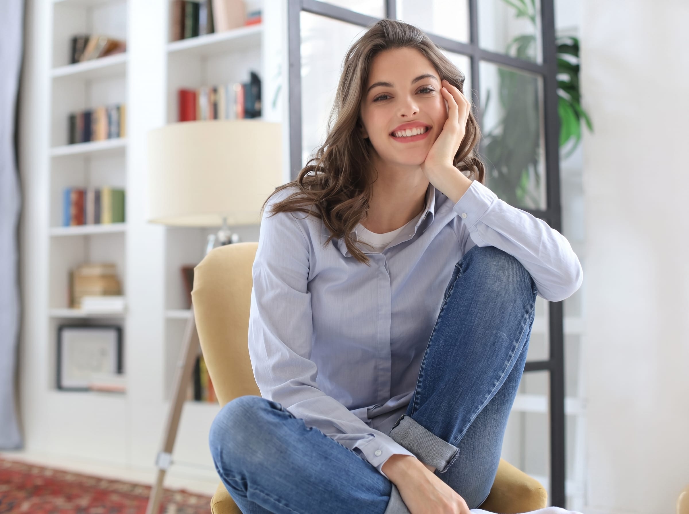 Relaxed, smiling woman at home